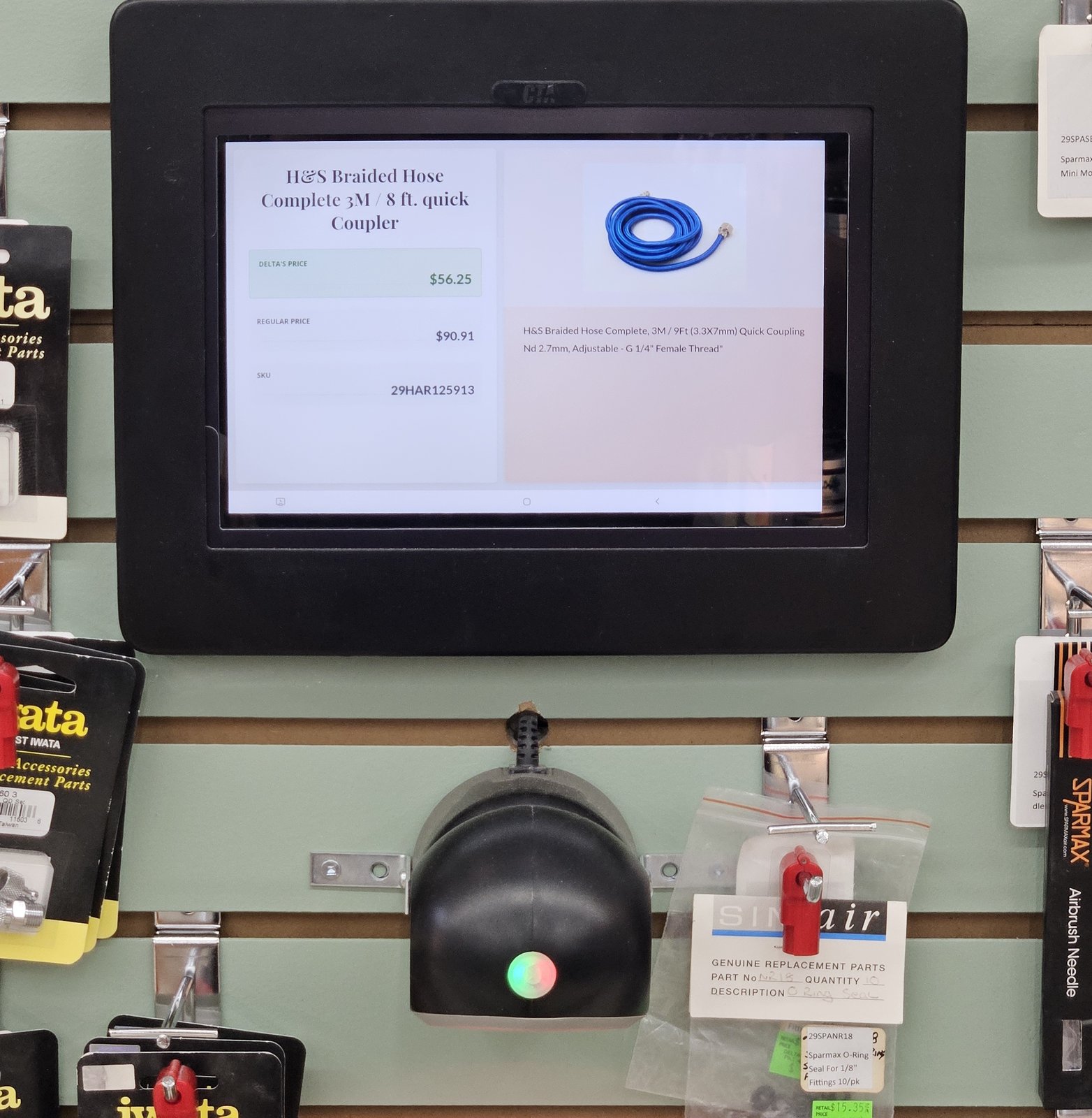 Price-check kiosk in use at Delta Art